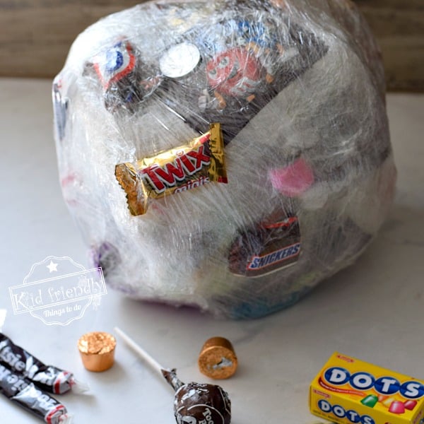 You are currently viewing The Saran Wrap Candy Ball Game {Instructions and Fun Ideas} | Kid Friendly Things To Do
