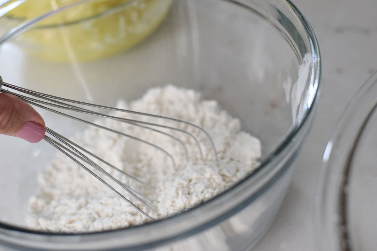 Flour salt and baking soda mixed for zucchini brownie batter