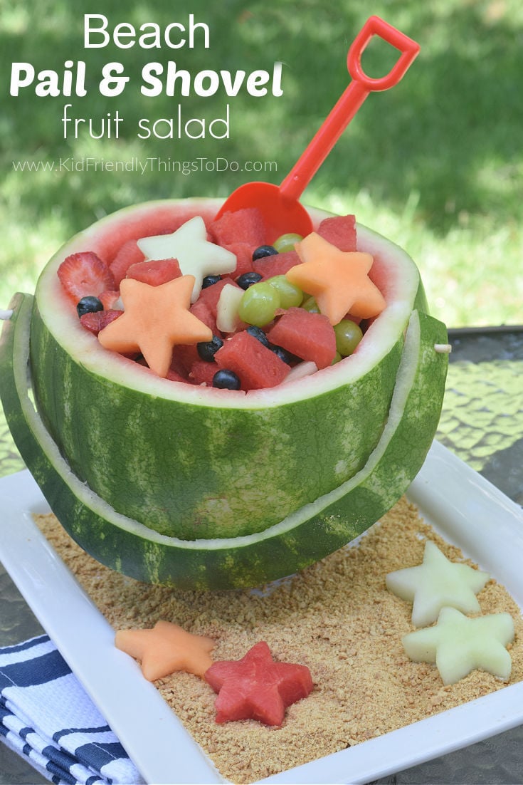 watermelon fruit salad shaped like a beach pail and shovel 