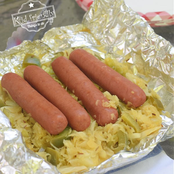 Read more about the article Brats and Sauerkraut {Foil Packet} | Kid Friendly Things To Do
