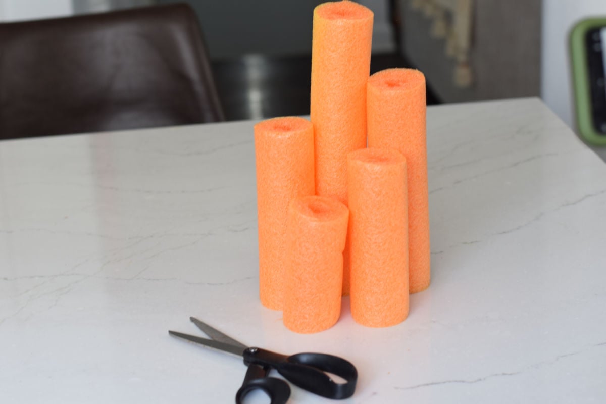 making Halloween pool noodle candles 