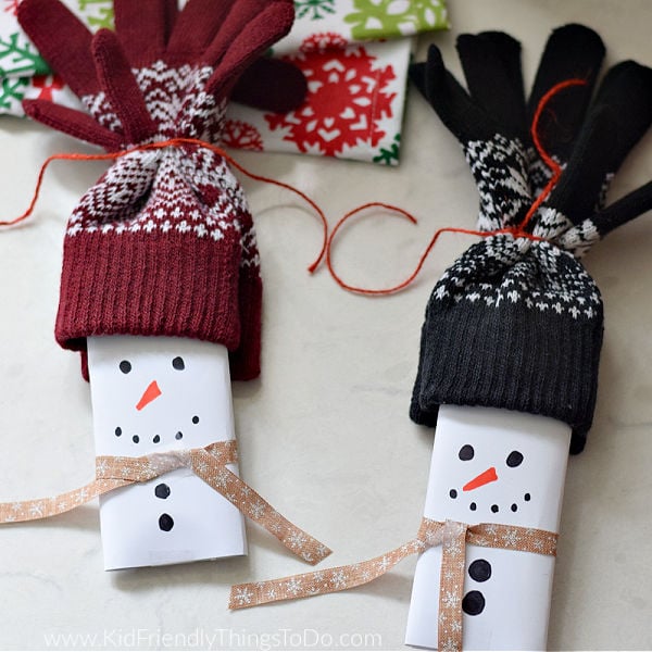 a candy bar snowman and gloves