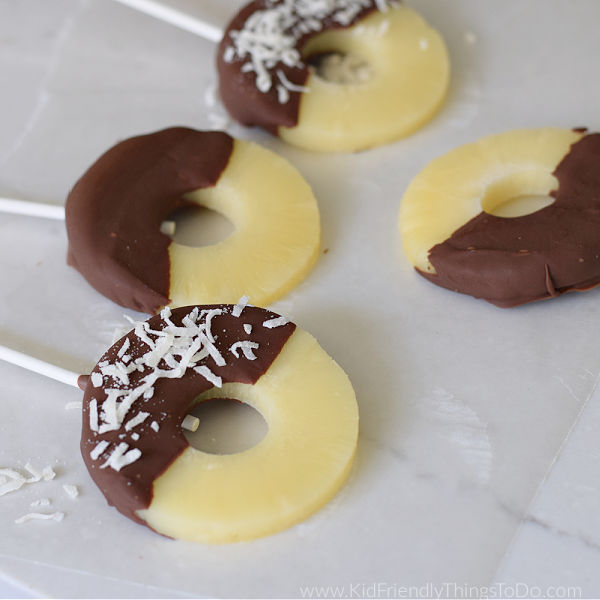 making chocolate pineapple popsicles 