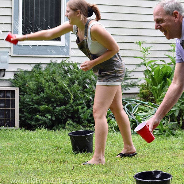 Read more about the article Toss the Water {Hilarious Water Game!}