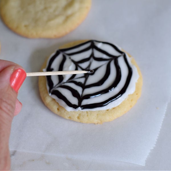 making a spider web cookie 