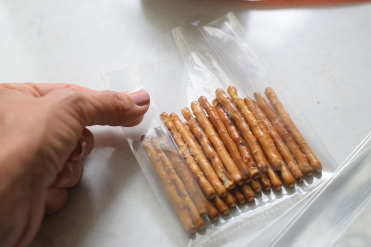 putting pretzels in bag