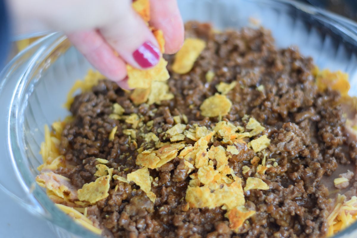 making Dorito taco bake 