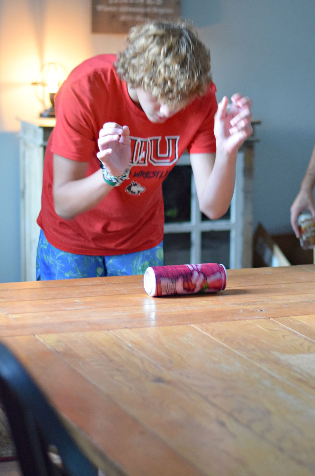 playing the soda can challenge 