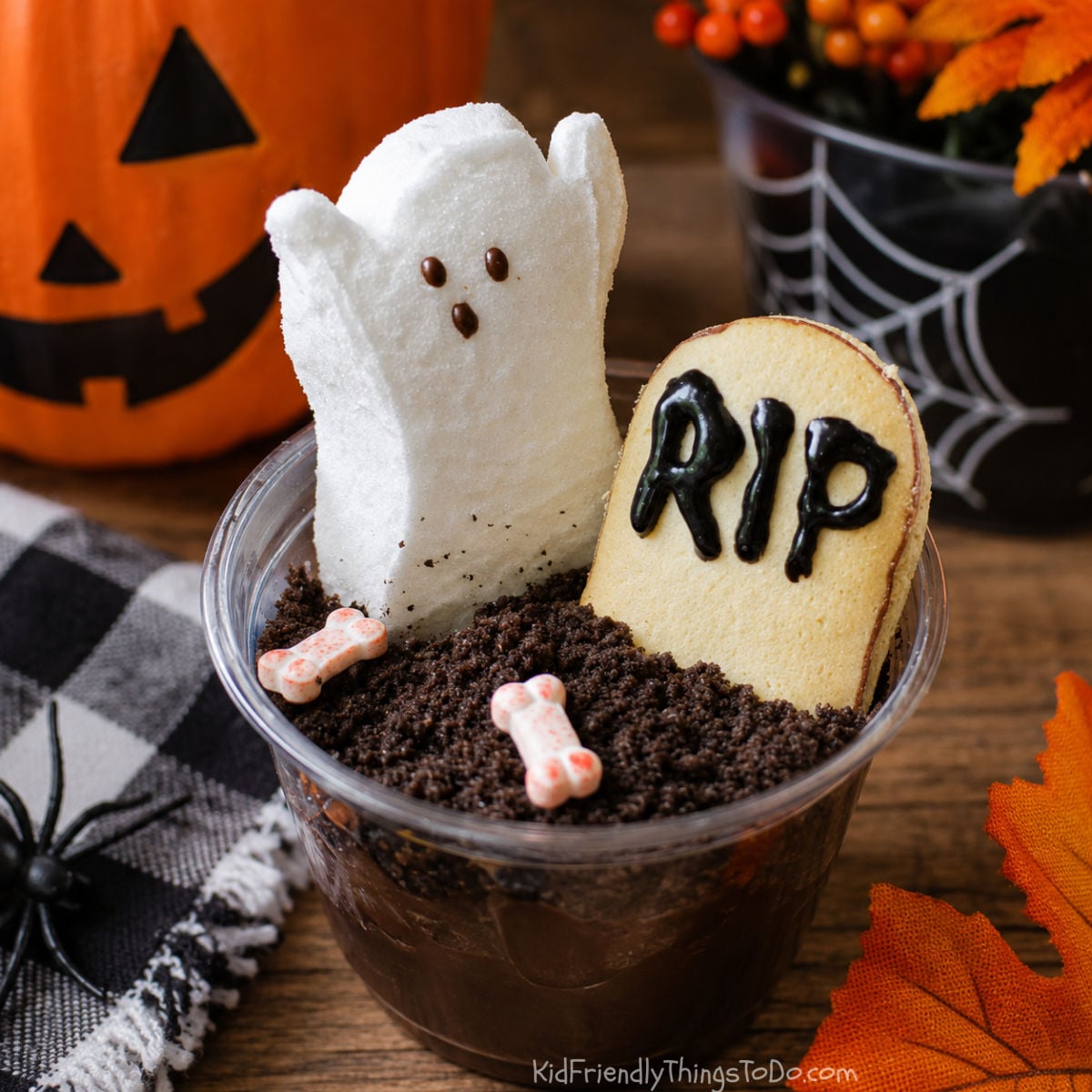 Halloween dirt pudding cups with graveyard scene