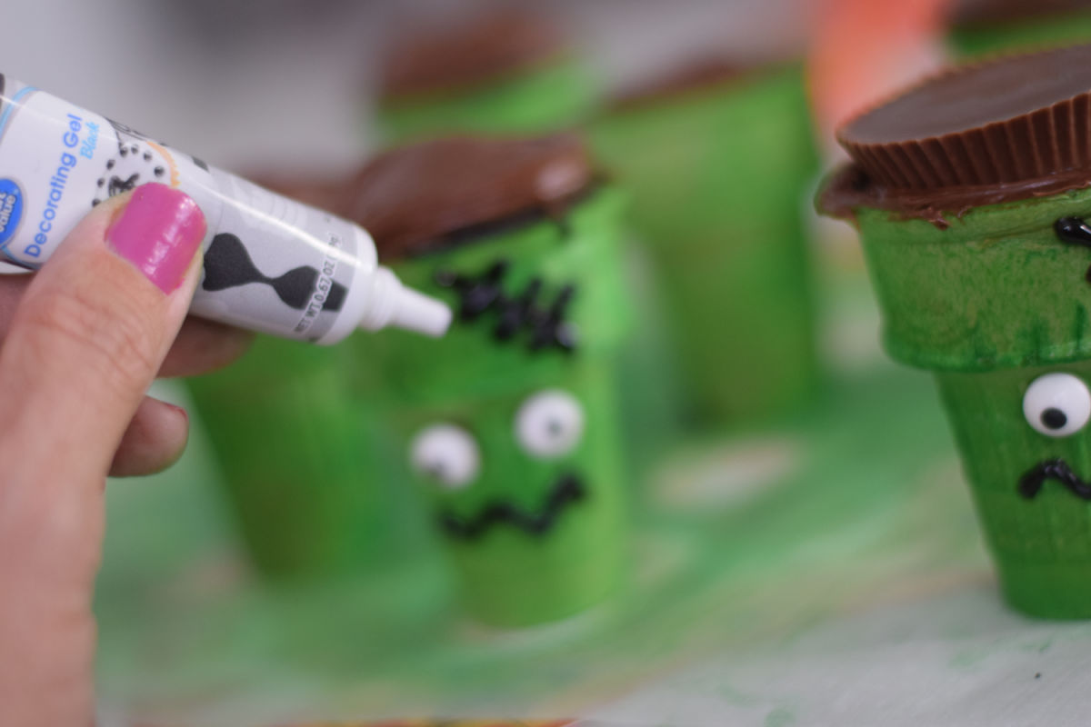 making Frankenstein cupcakes 