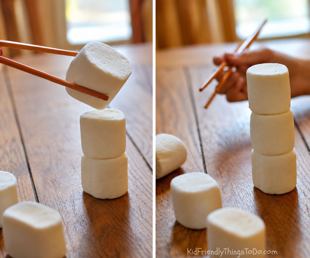 Stacking marshmallows with chopsticks for a Snowman Stack Christmas Minute to Win It game.