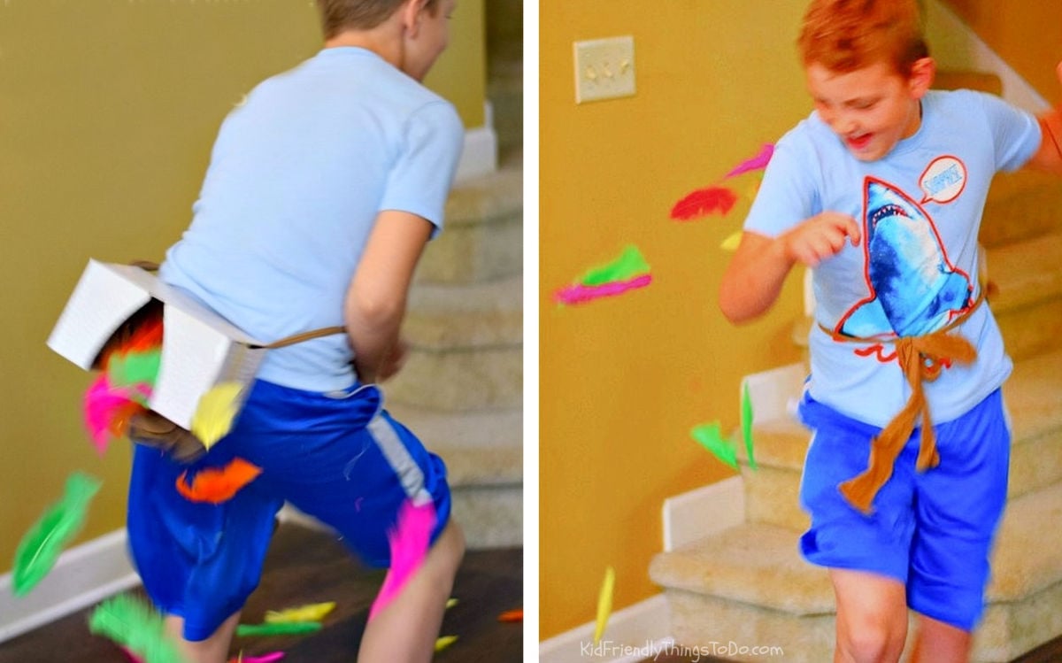 Shake Ya Tail Feather Thanksgiving Minute to Win It game with feathers flying from a tissue box
