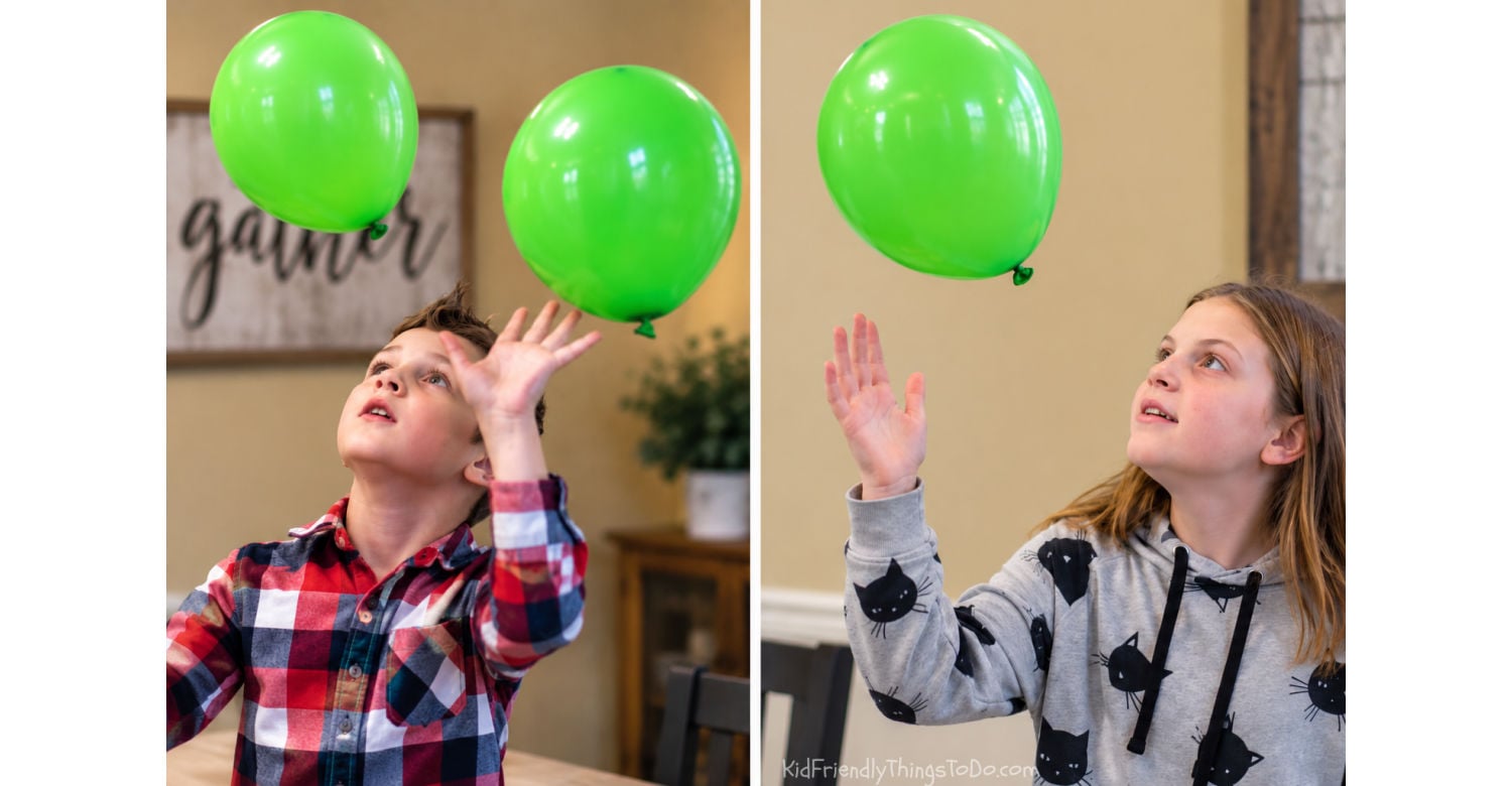 Kids playing Defy Gravity Thanksgiving Minute to Win It balloon game