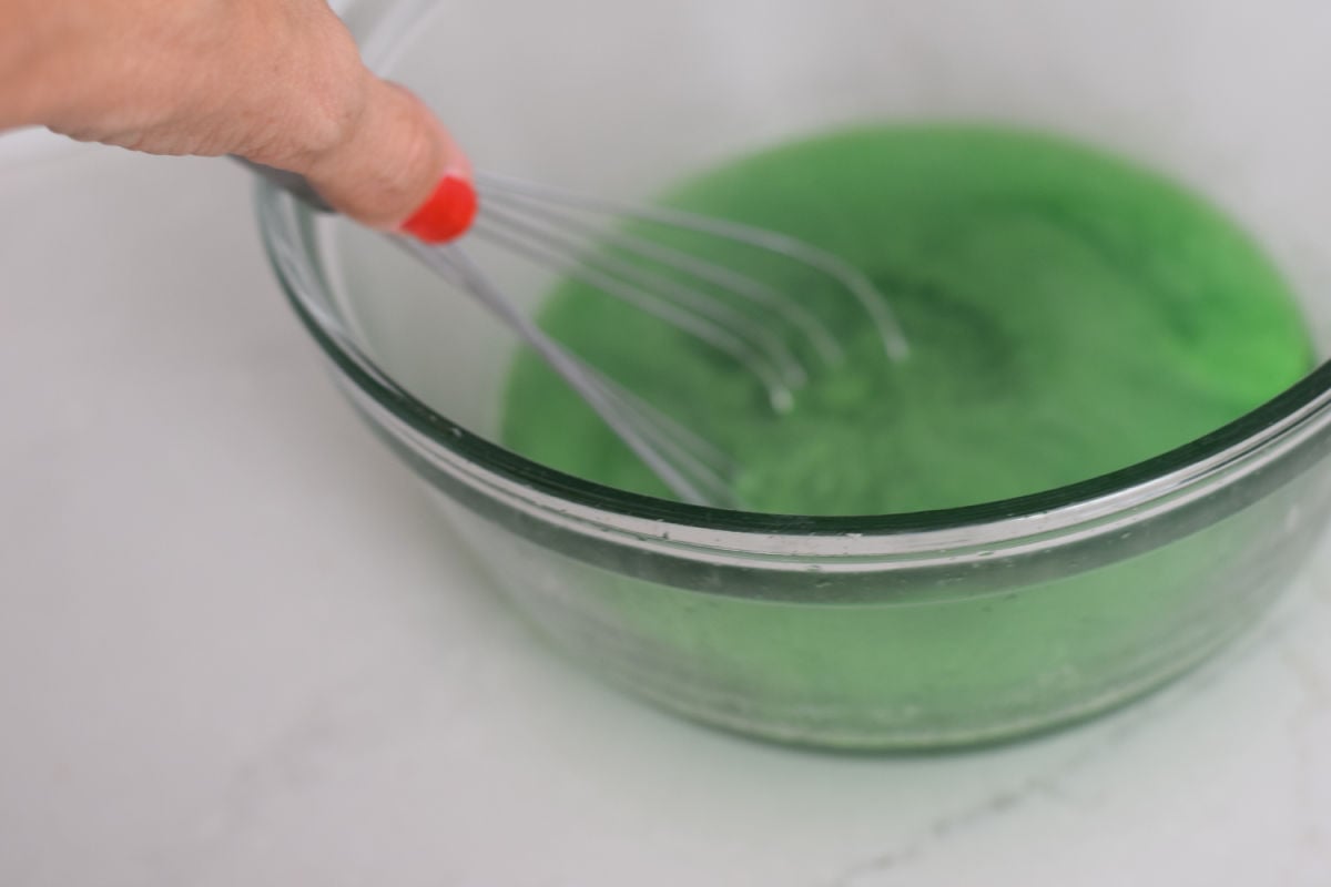 mixing Jell-O for witch snack 