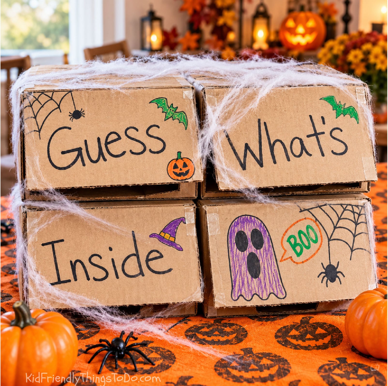 Guess What's Inside Halloween Guessing Game made from stacked boxes and Halloween drawings 