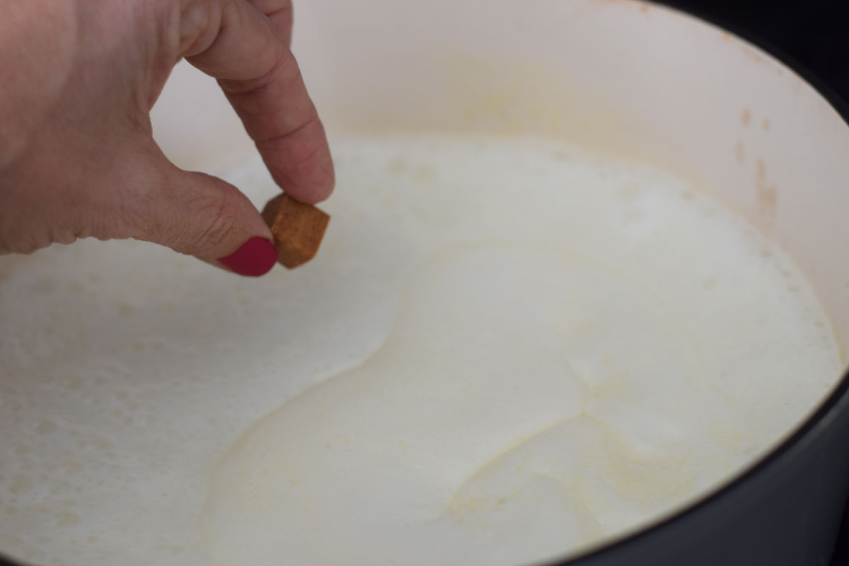 adding chicken bouillon to soup