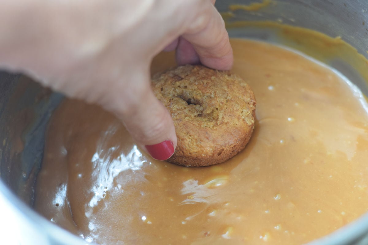 dipping muffins in caramel sauce 