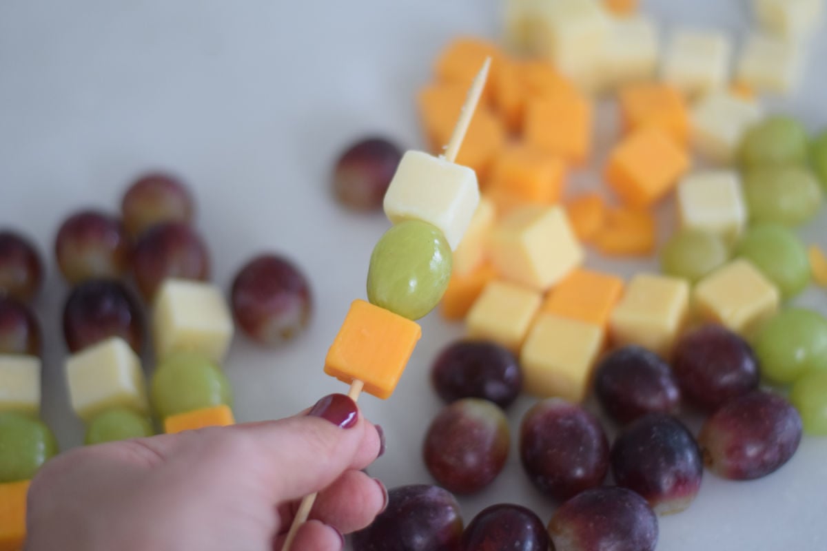 making fruit skewers 