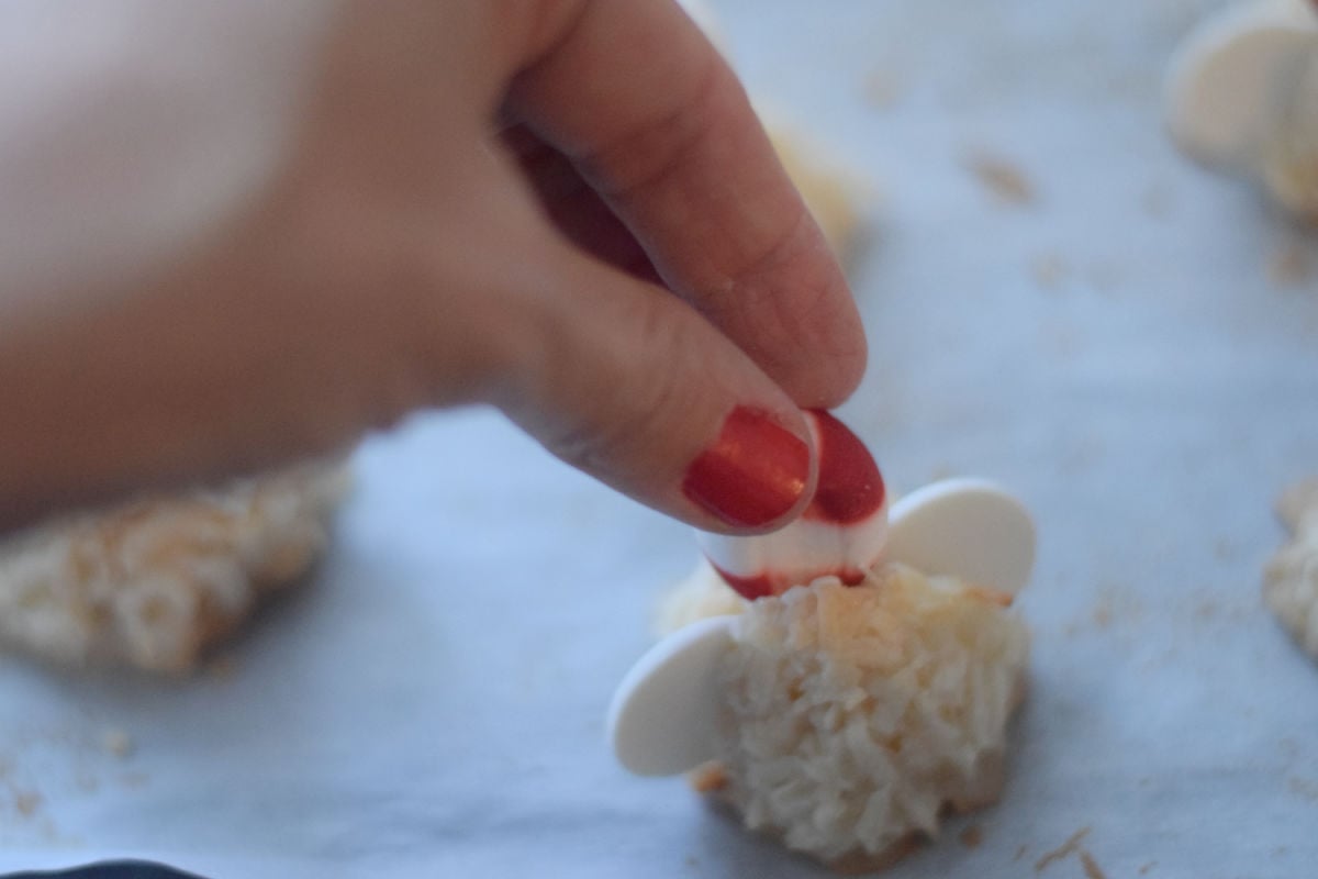 adding peppermint candy to macaroons