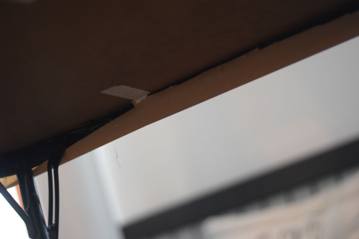 taping paper to table