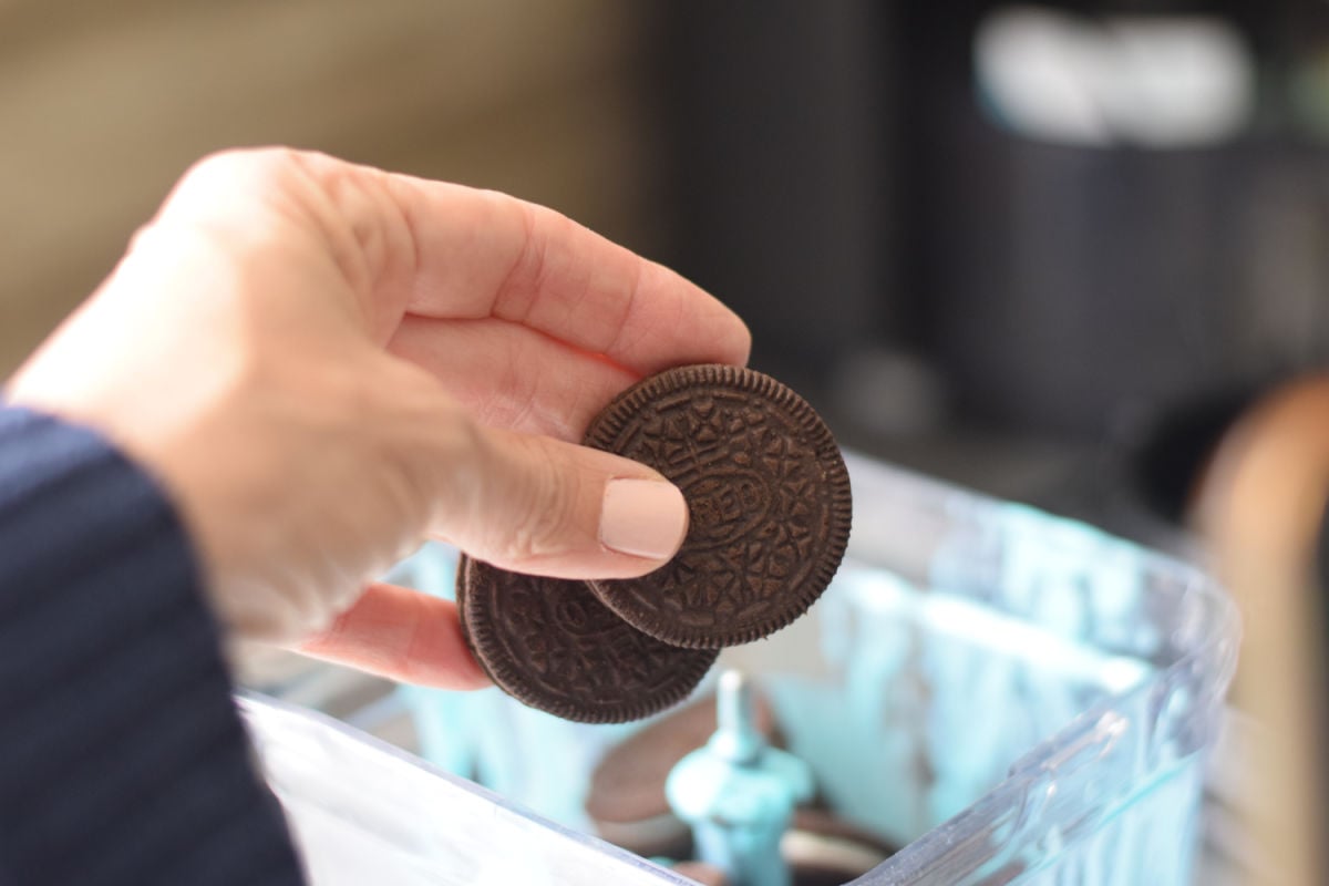adding Oreo cookies to blender
