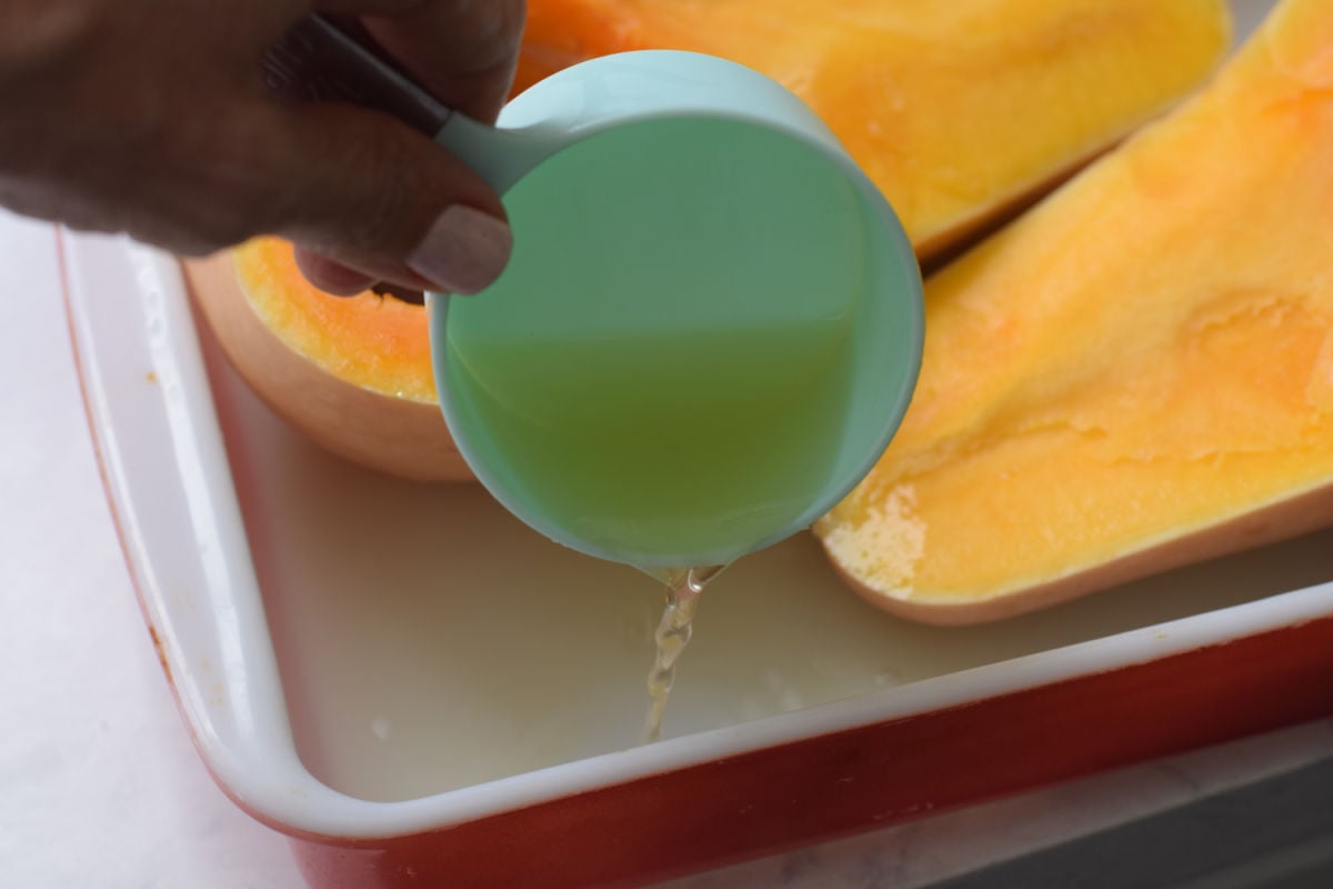 adding broth to squash