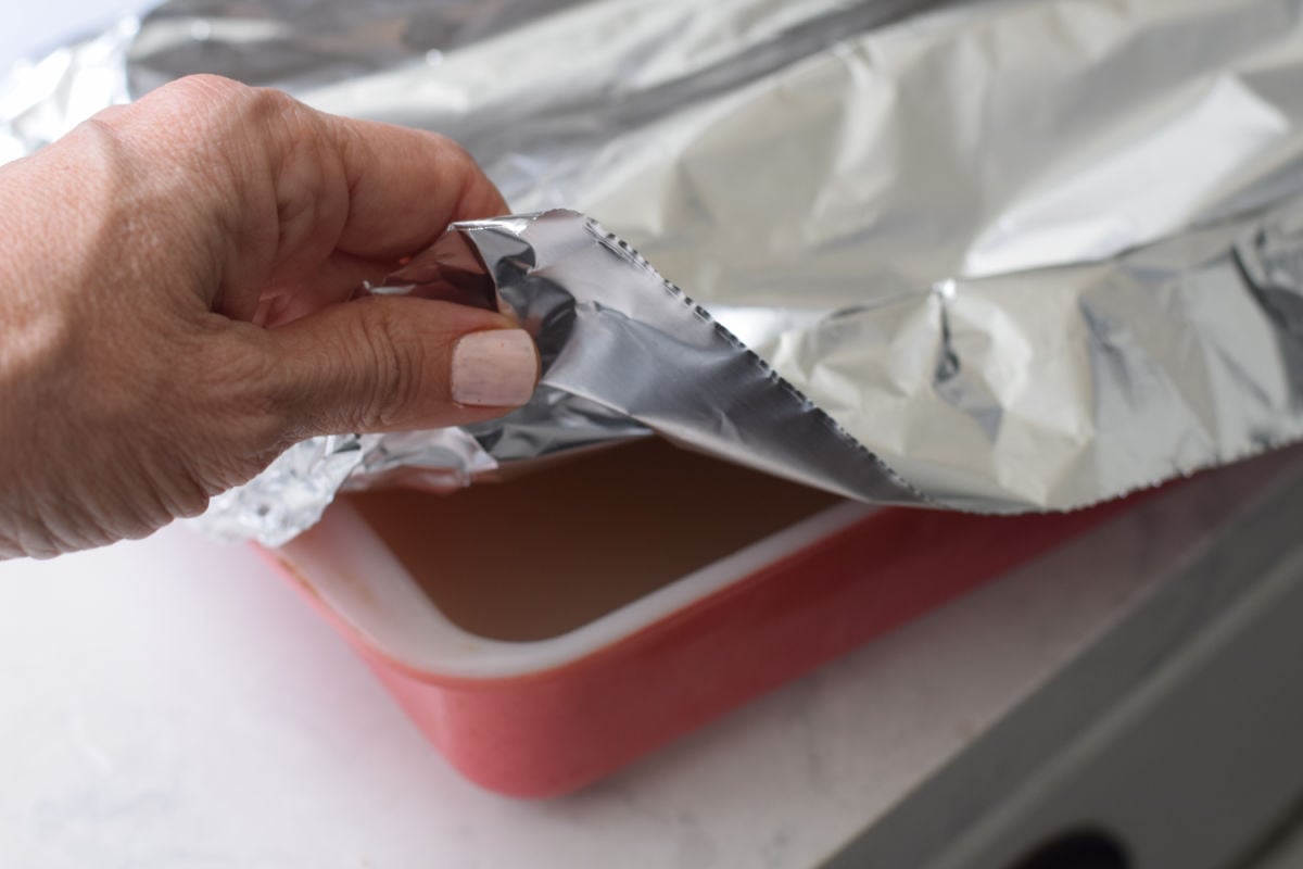 adding foil to pan