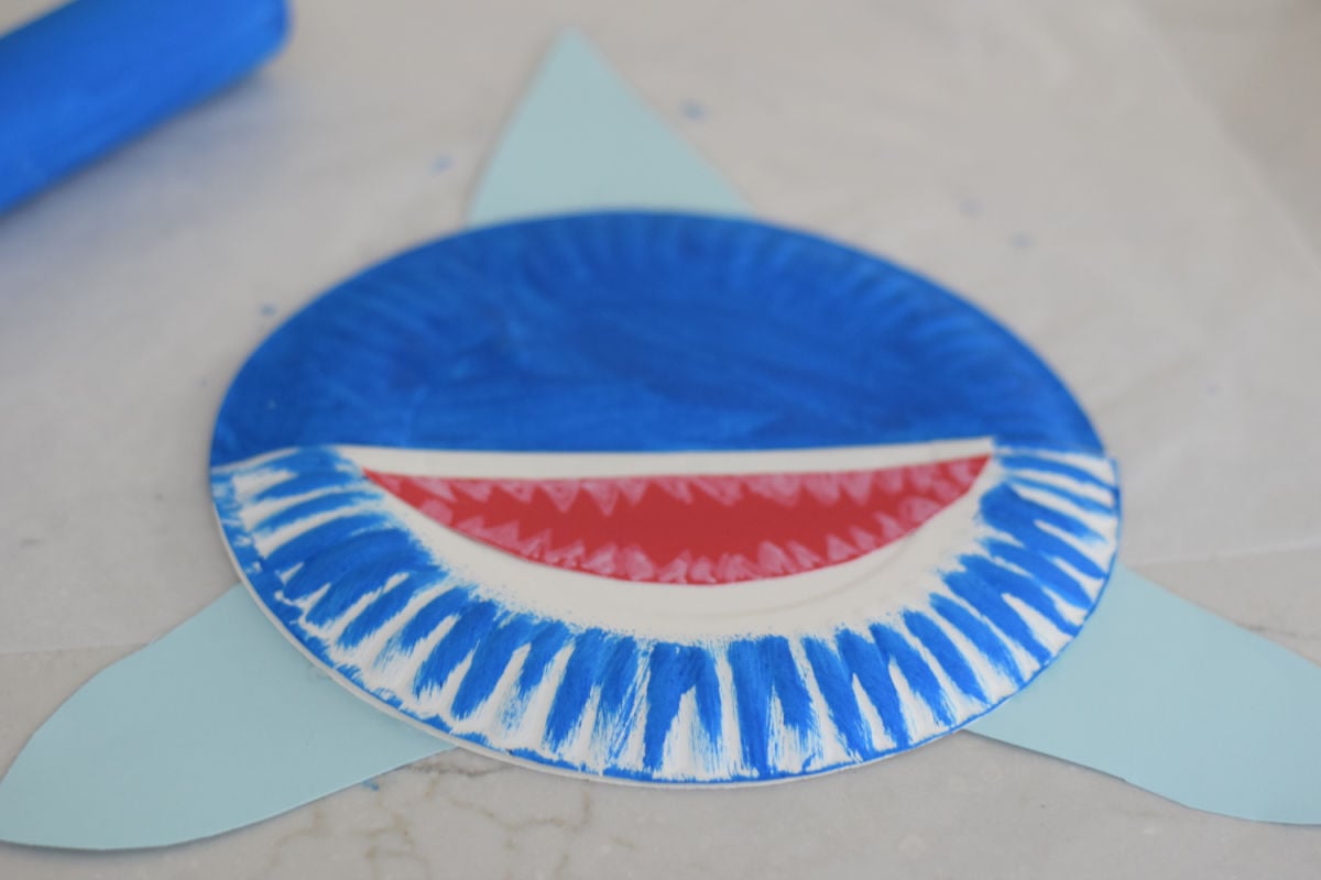 gluing fins onto shark craft