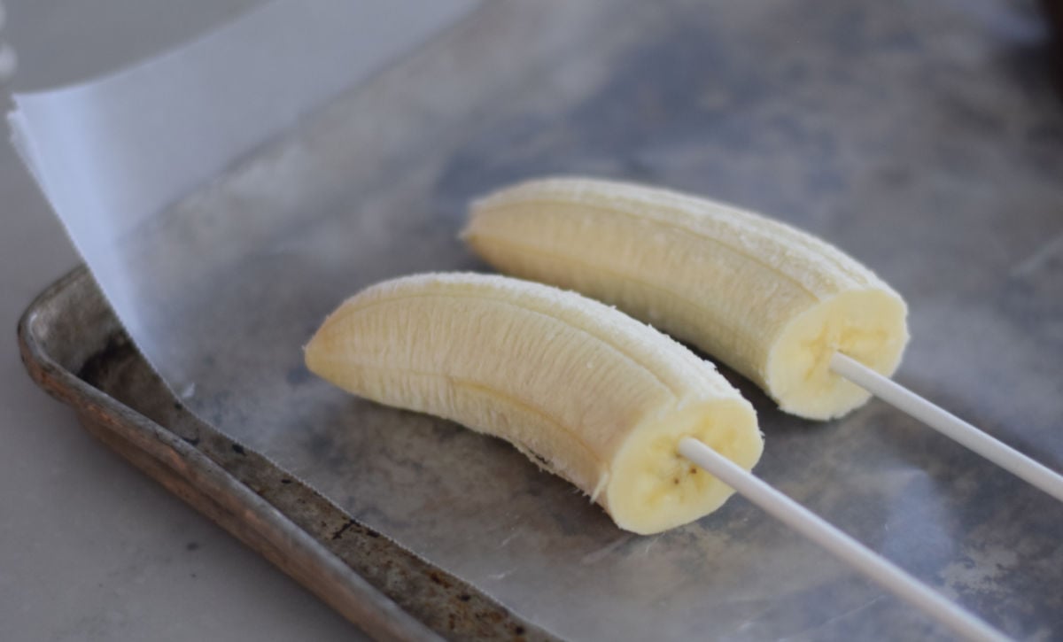 popsicle sticks in bananas