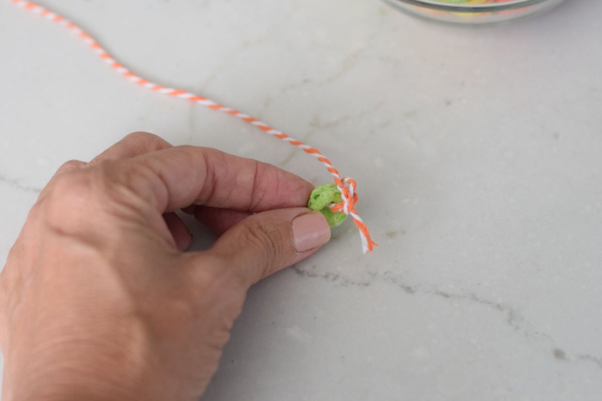 making a fruit loop bracelet