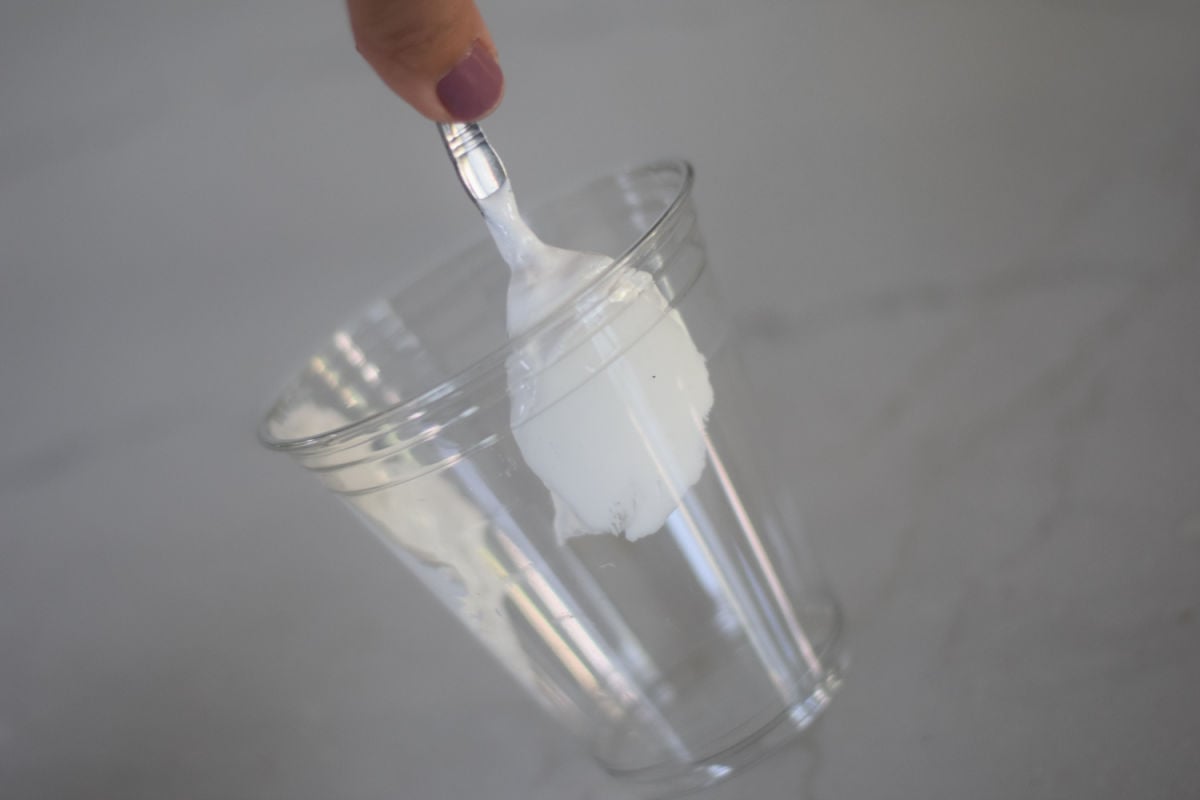 smearing fluff onto cup