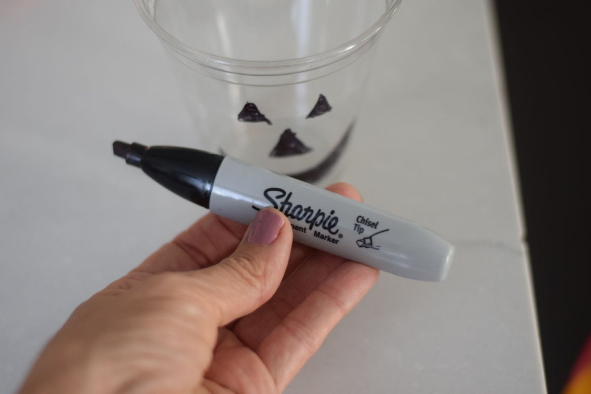 making a Jack-O-Lantern face on a cup