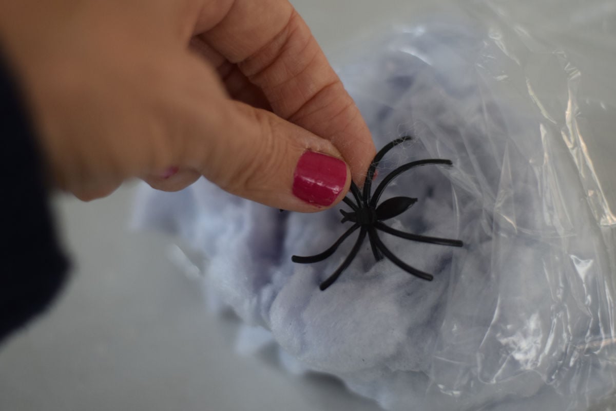 making sticky spider webs with cotton candy 