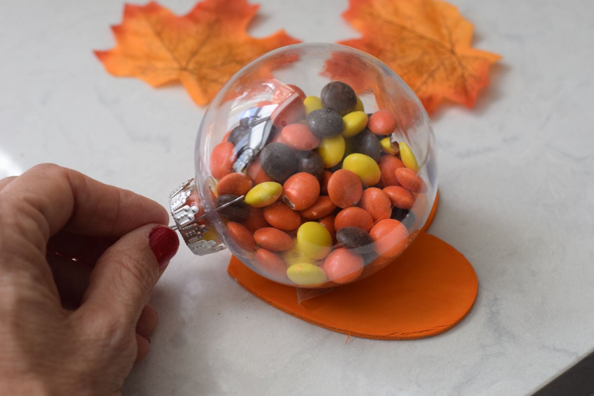 gluing ornament to base 