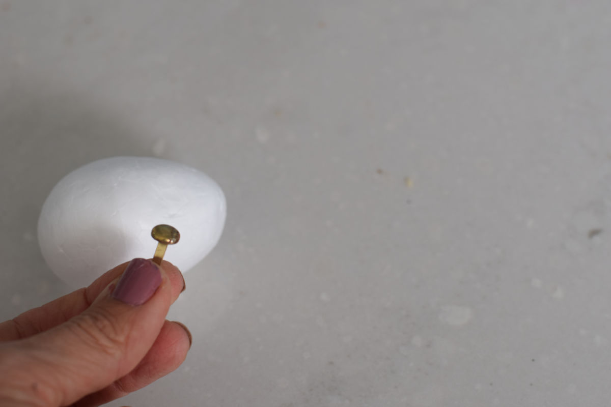 adding brad to foam egg