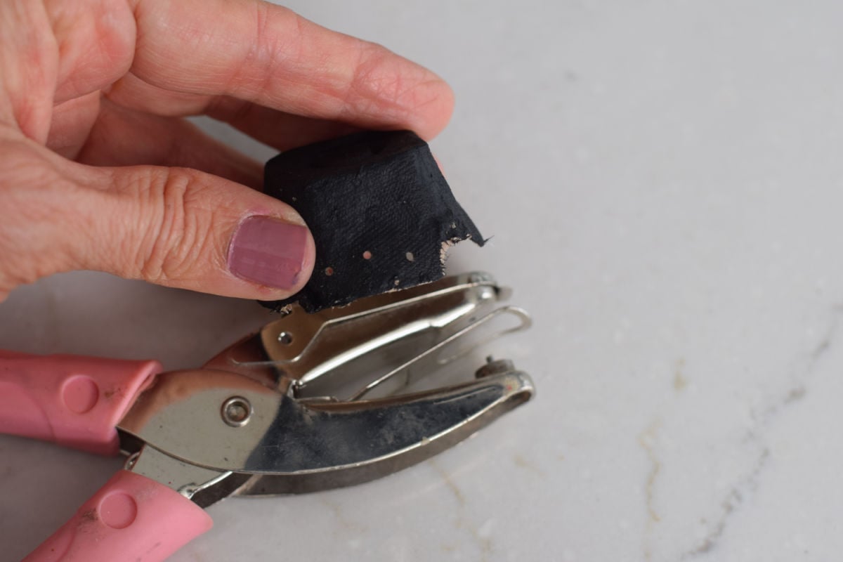 punching holes in egg carton for craft
