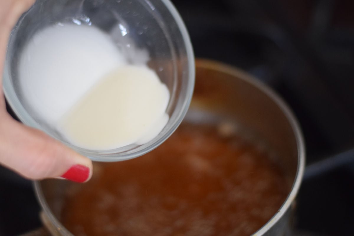 adding cornstarch to pot 