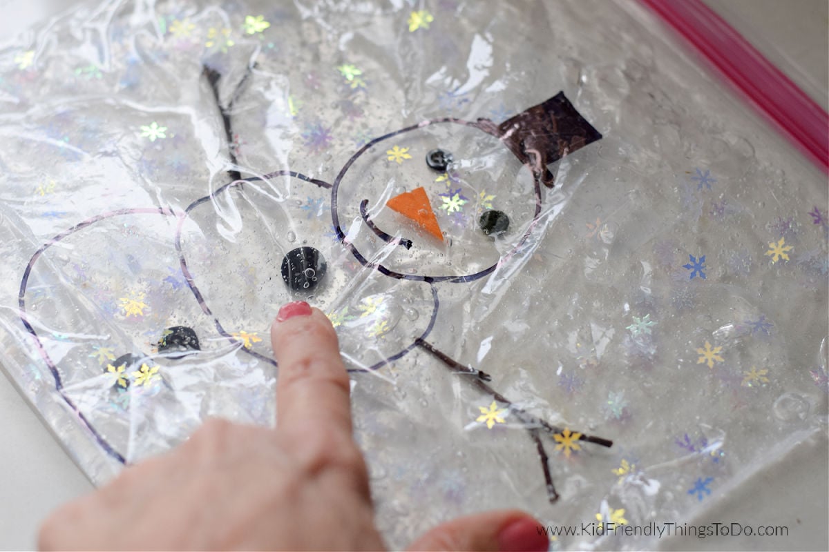 playing with build a snowman sensory bag
