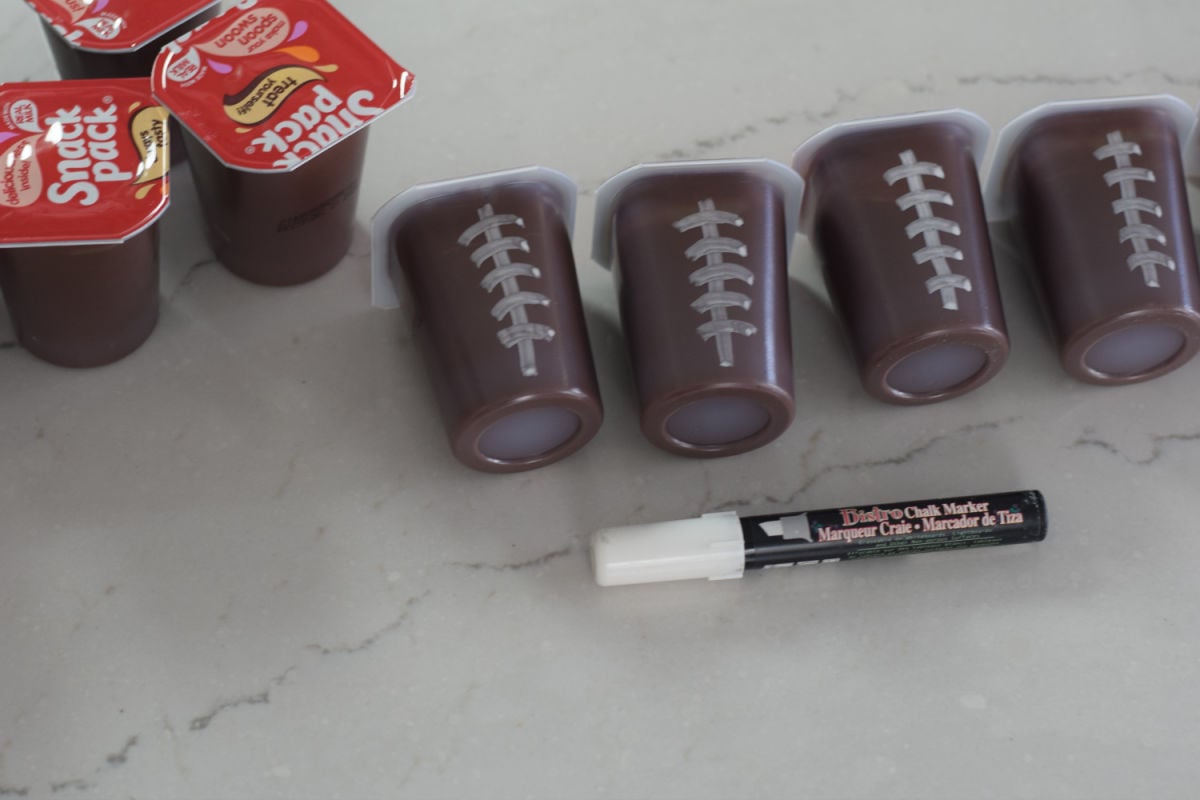 drawing laces on pudding cups 