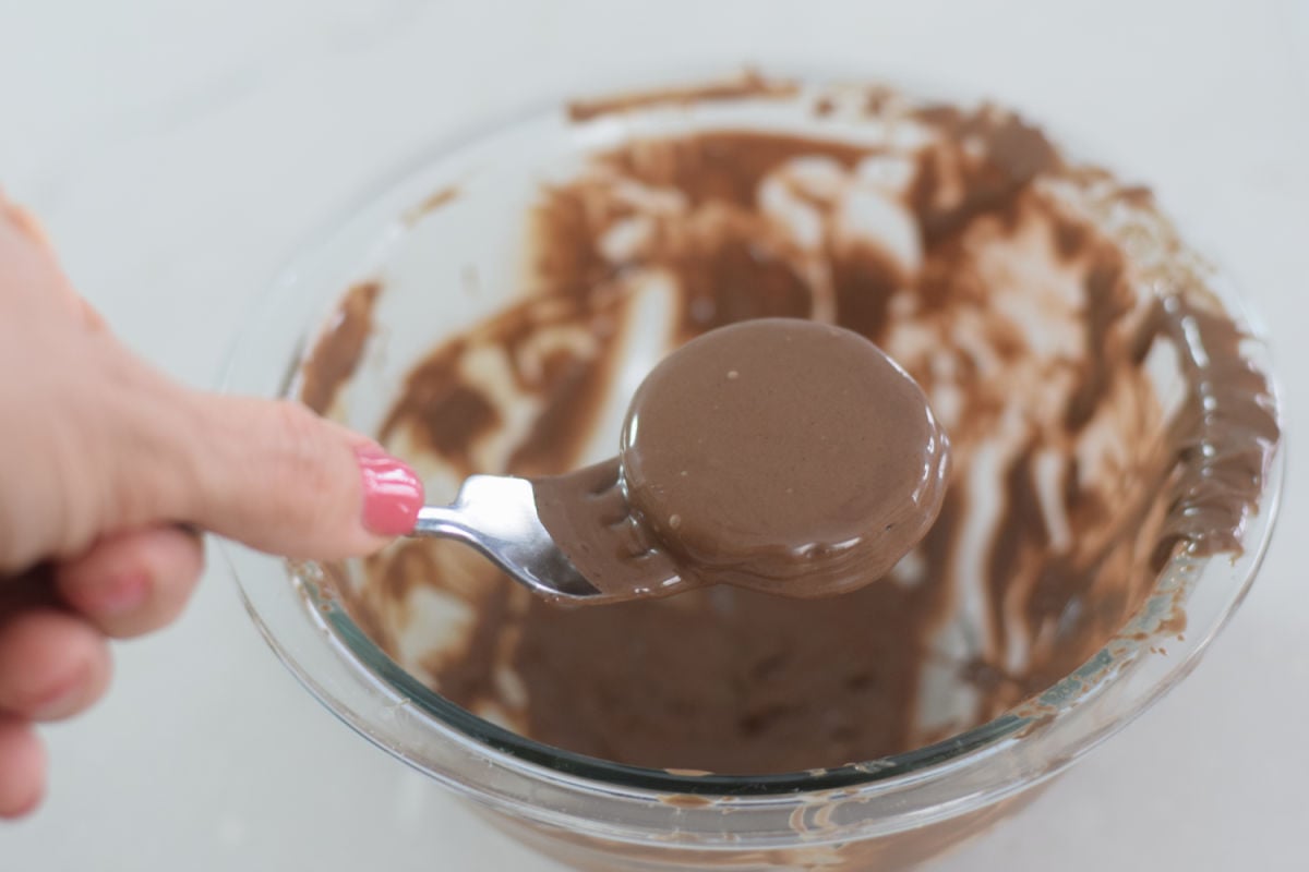 dipping Oreos in chocolate 