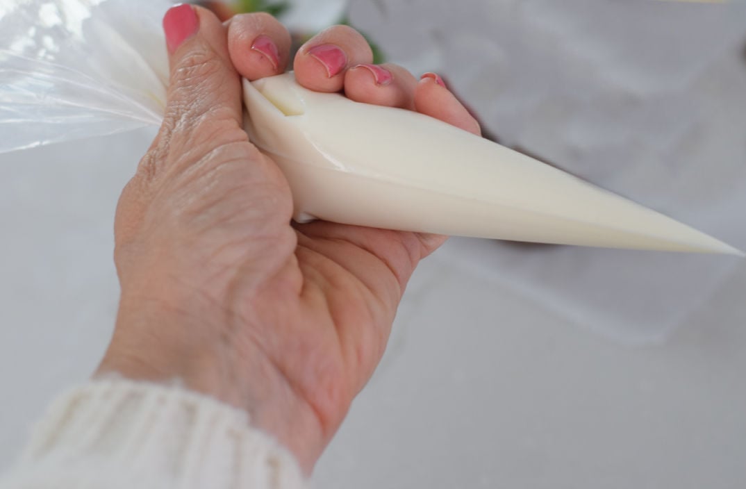 white chocolate in a piping bag 