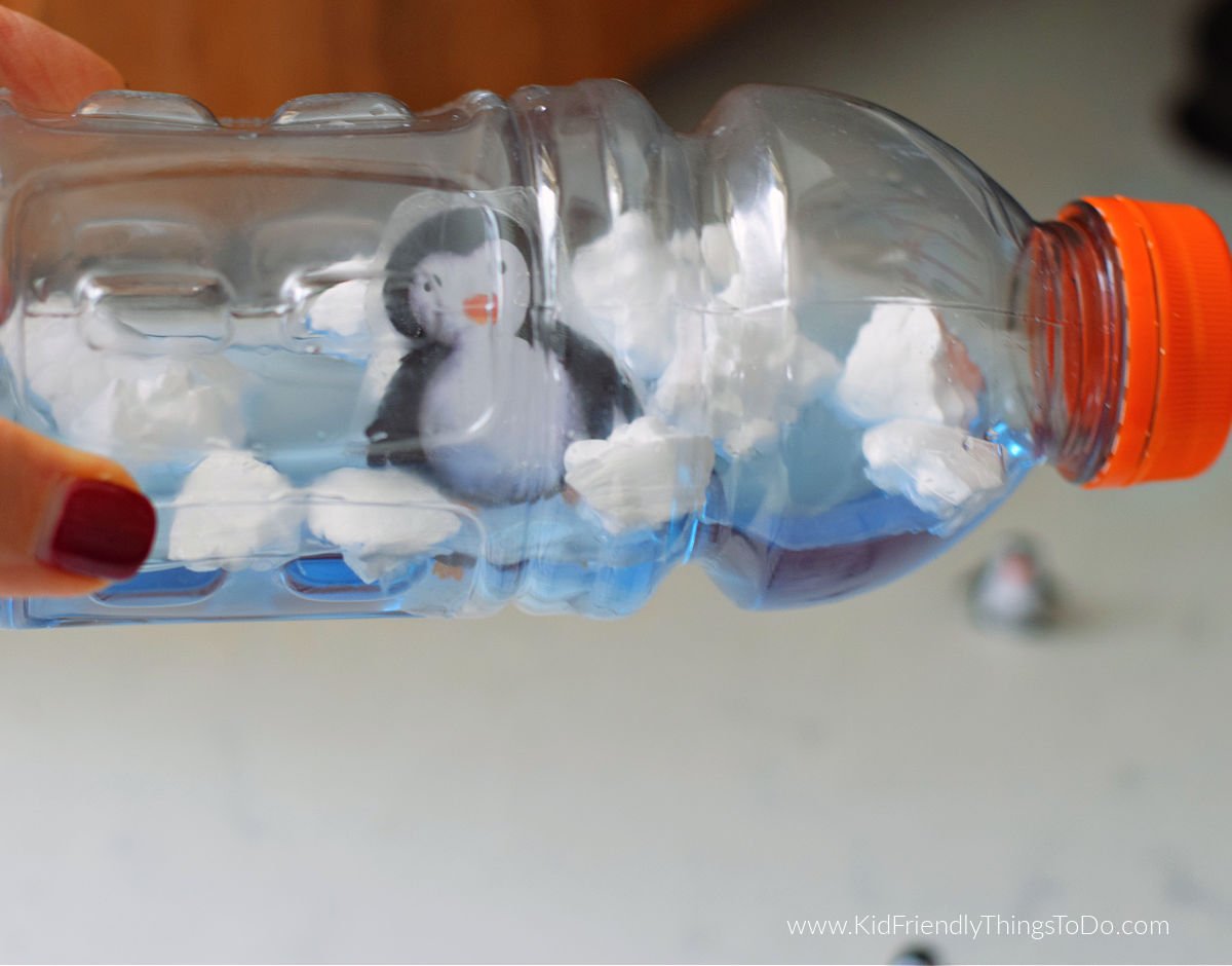 winter sensory bottle with penguin