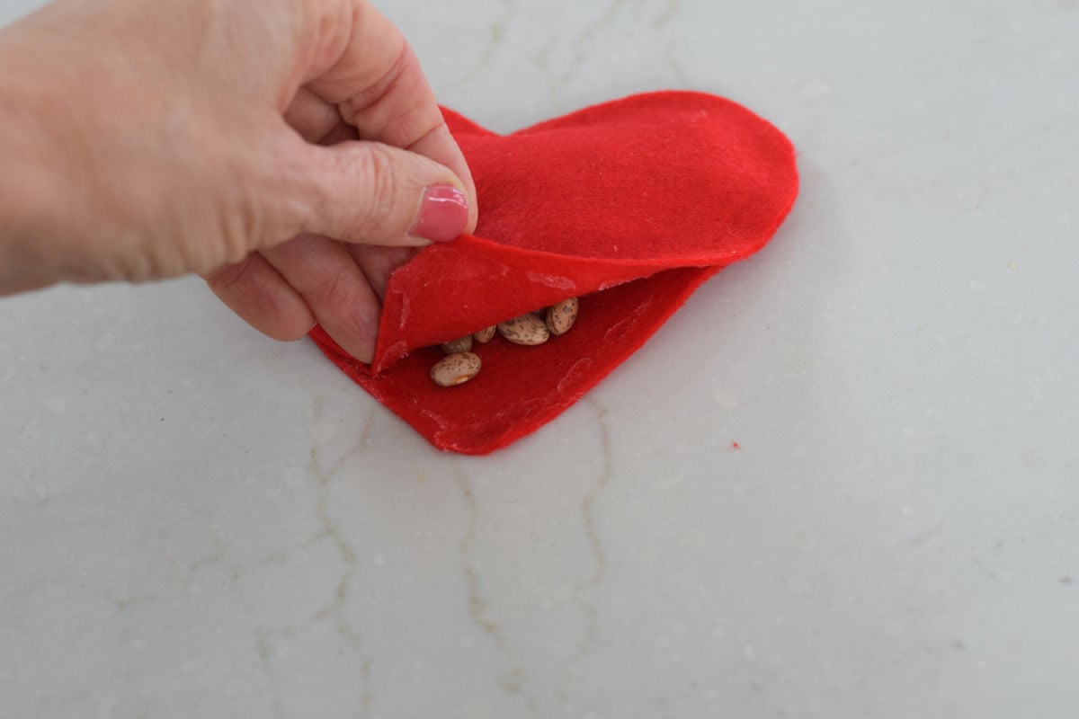 gluing felt hearts together 