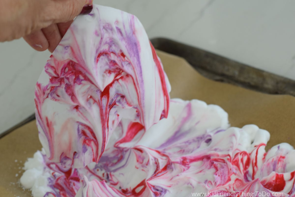 lifting paper up from marbled shaving cream