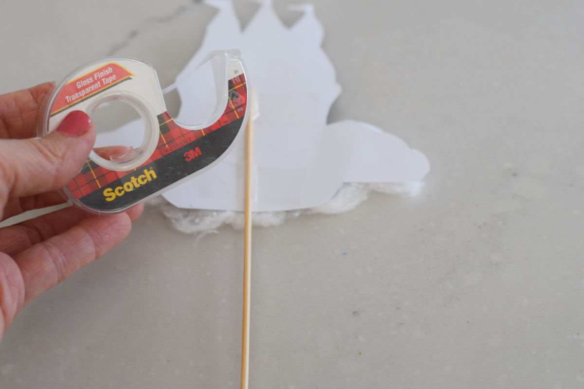 attaching castle and photo to dowel