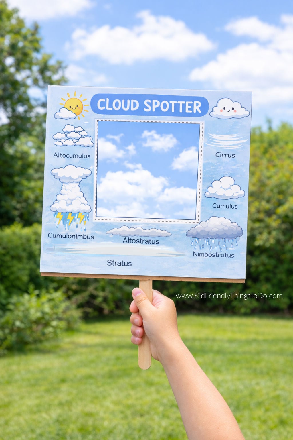 Child holding cloud spotter printable 