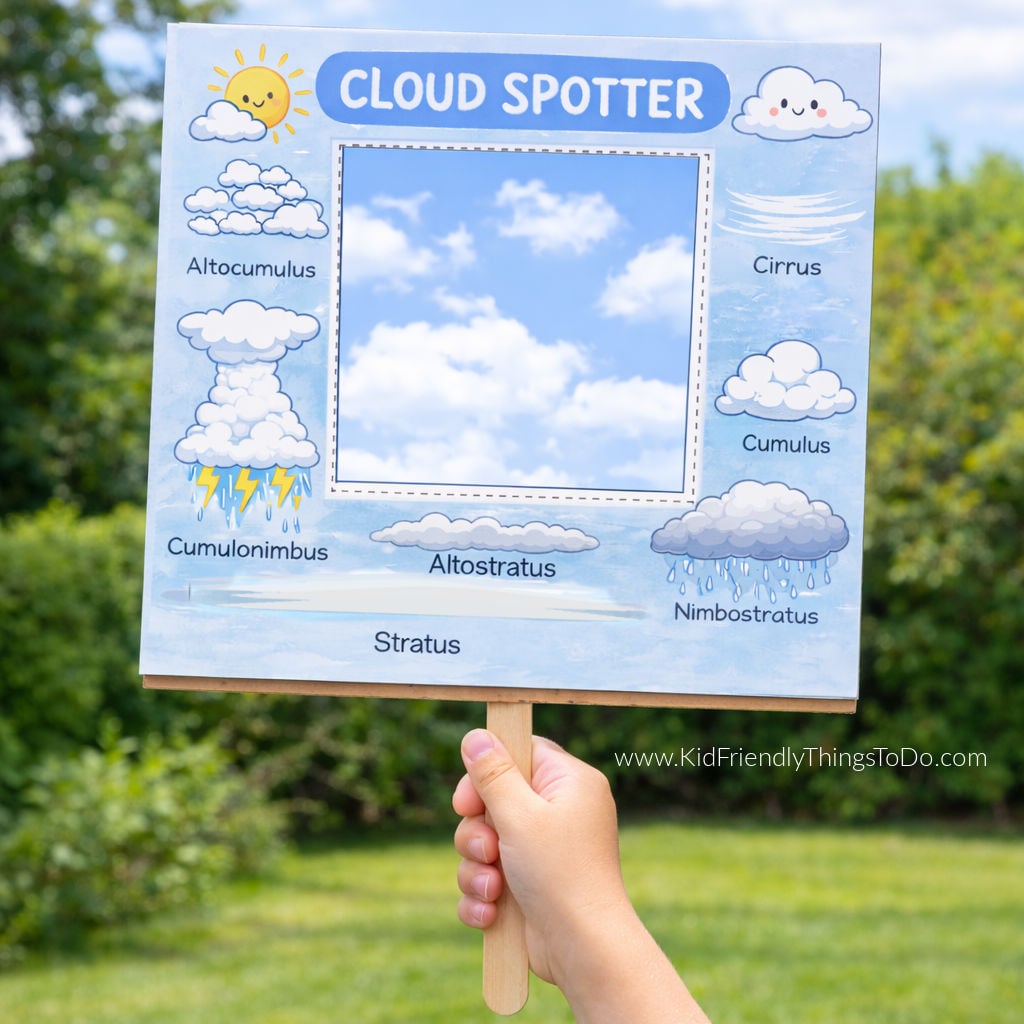 child holding a cloud spotter printable