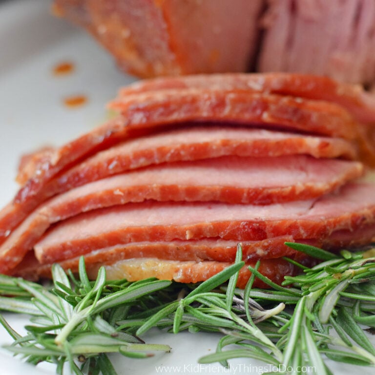 brown sugar glazed ham on platter