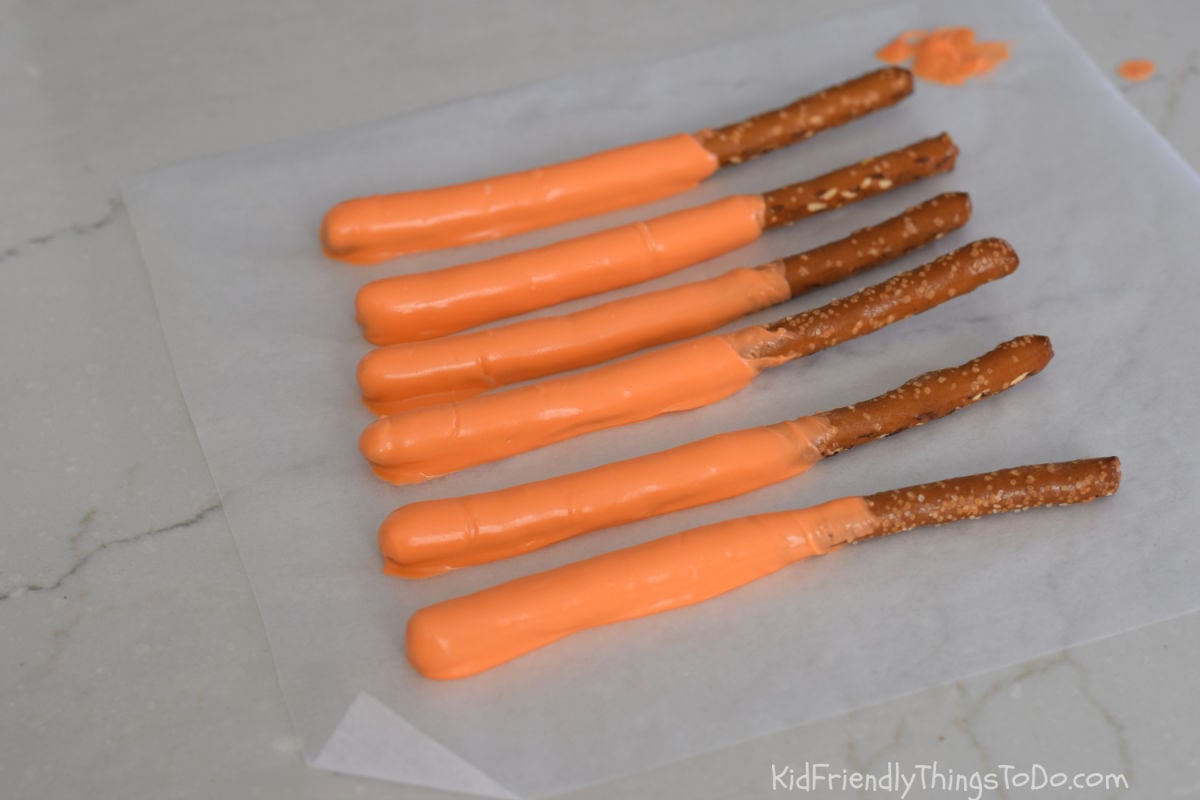 carrot pretzels drying on wax paper