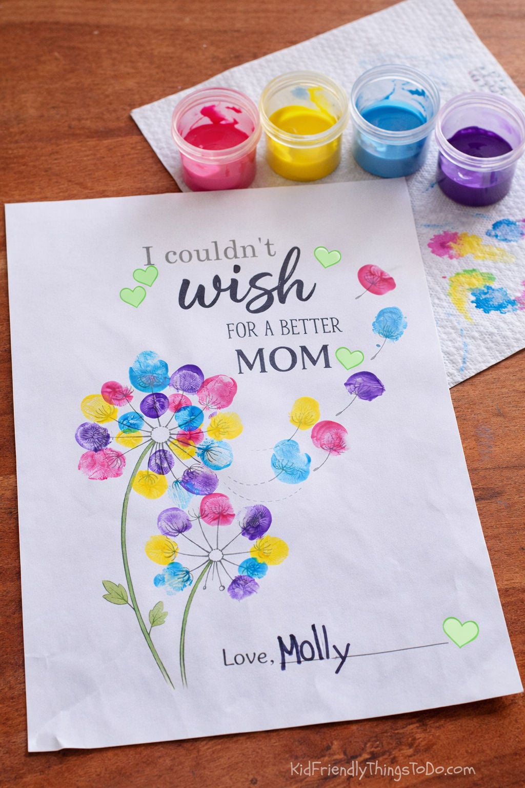 Colorful fingerprint dandelion Mother’s Day craft printable made with kids paint